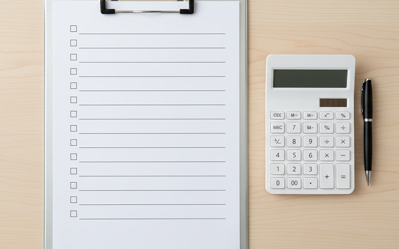 Clipboard and calculator for dental costs